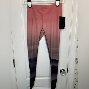 Gaiam Jessica Biel sunset leggings. Women’s size small.NWT